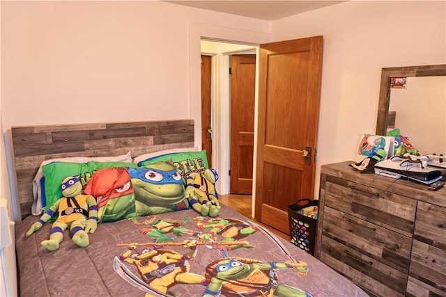 bedroom featuring hardwood / wood-style flooring