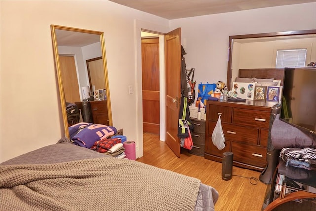 bedroom featuring light hardwood / wood-style floors