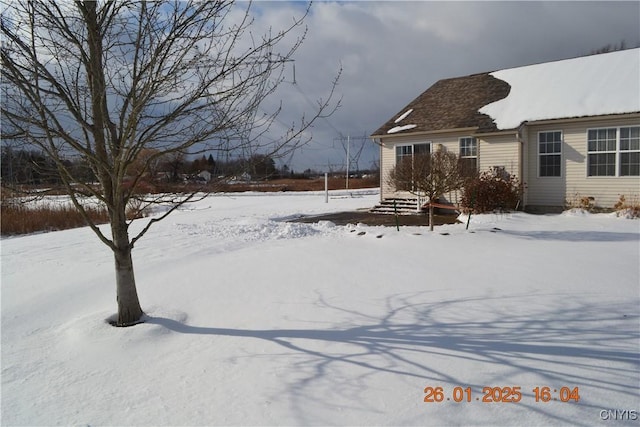 view of snowy yard