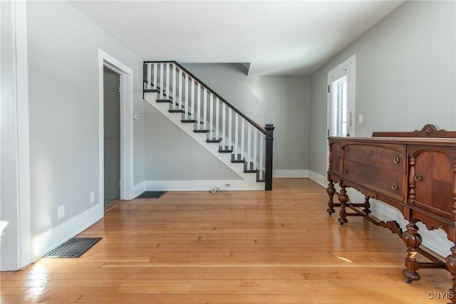 foyer with light wood-type flooring