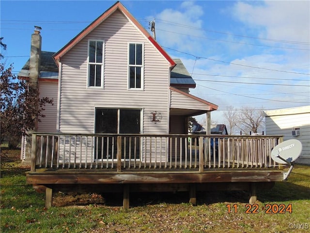 rear view of property with a deck