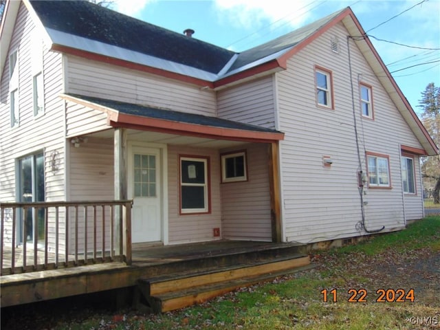 back of house with covered porch