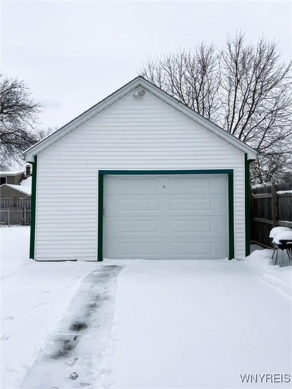 view of snow covered garage