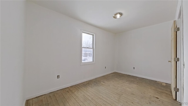 empty room with light wood-type flooring