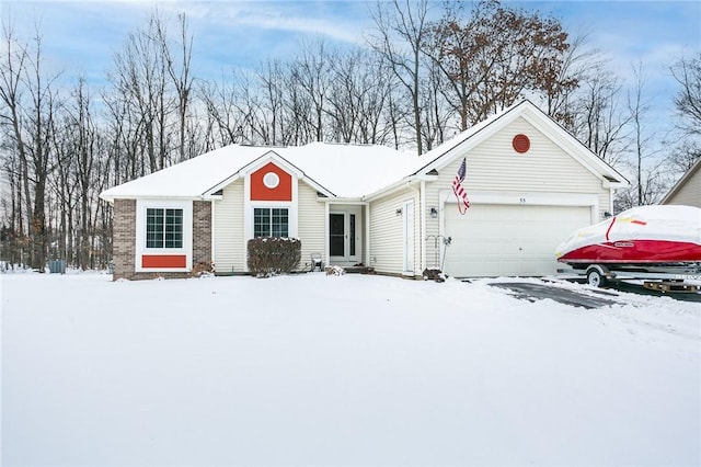 ranch-style house featuring a garage