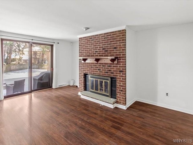 unfurnished living room featuring hardwood / wood-style flooring and a fireplace