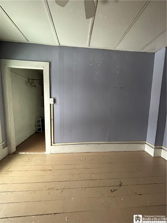 spare room featuring hardwood / wood-style floors