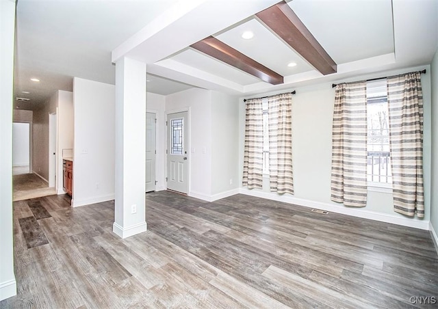 interior space with hardwood / wood-style floors and a healthy amount of sunlight