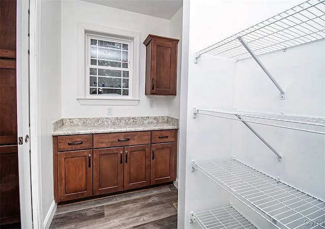 interior space featuring vanity and hardwood / wood-style floors