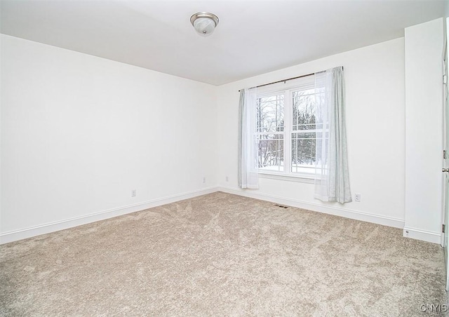 view of carpeted spare room