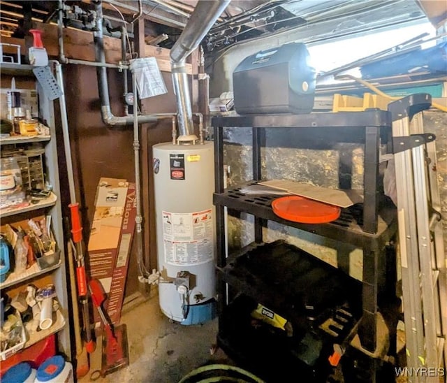 utility room featuring water heater