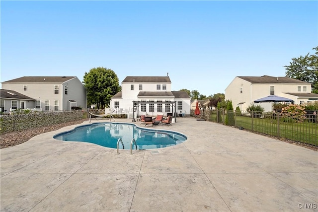 view of pool featuring a patio area