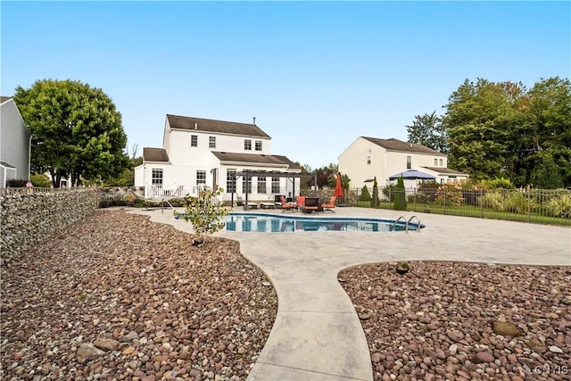 view of pool featuring a patio