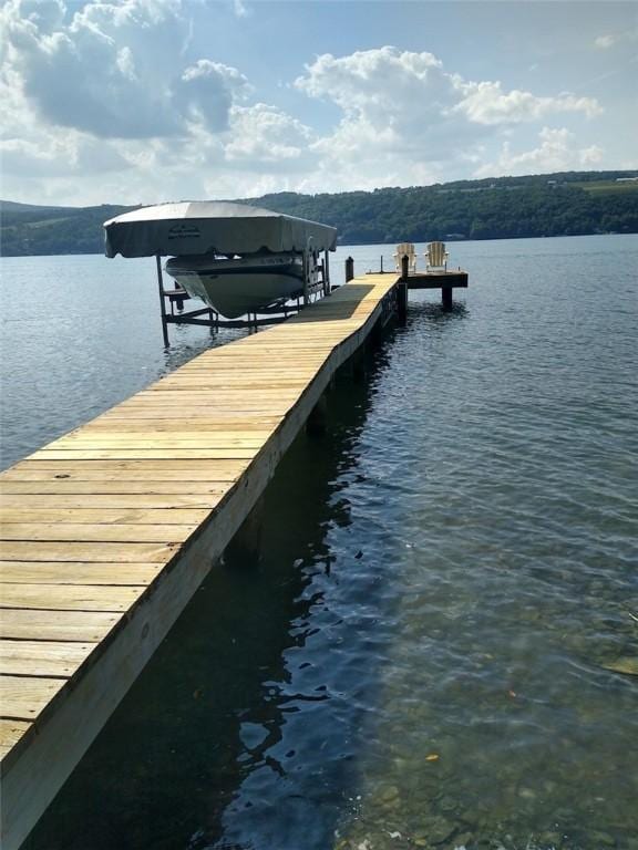 11995 E Lake Rd, Wayne, NY 14840 - dock featuring a water view and boat lift