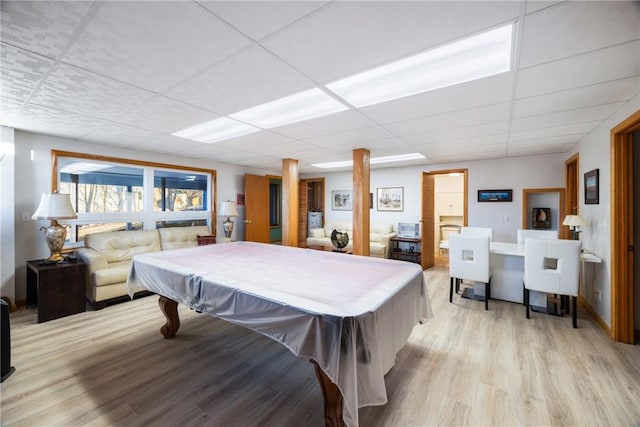 recreation room with pool table, a drop ceiling, and light hardwood / wood-style floors