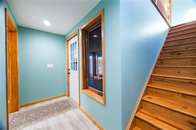 11995 E Lake Rd, Wayne, NY 14840 - hallway featuring wood finished floors, stairway, baseboards, and recessed lighting