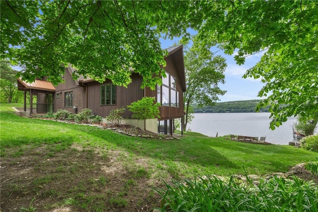 11995 E Lake Rd, Wayne, NY 14840 - view of home's exterior featuring a water view and a lawn