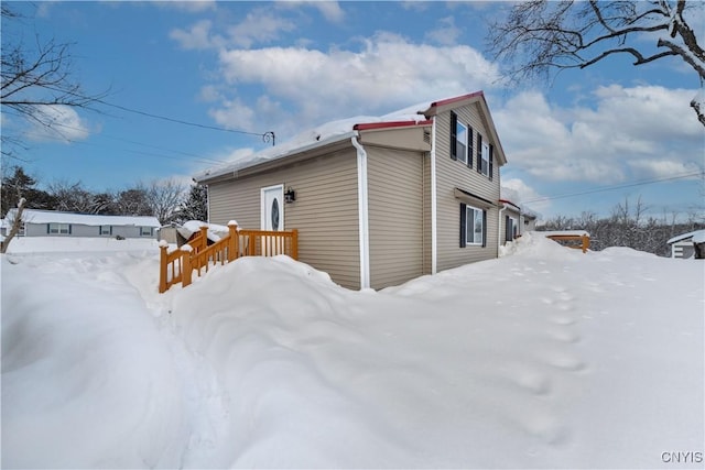 view of snow covered property