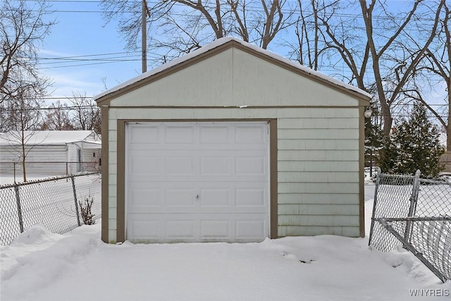 view of snow covered garage