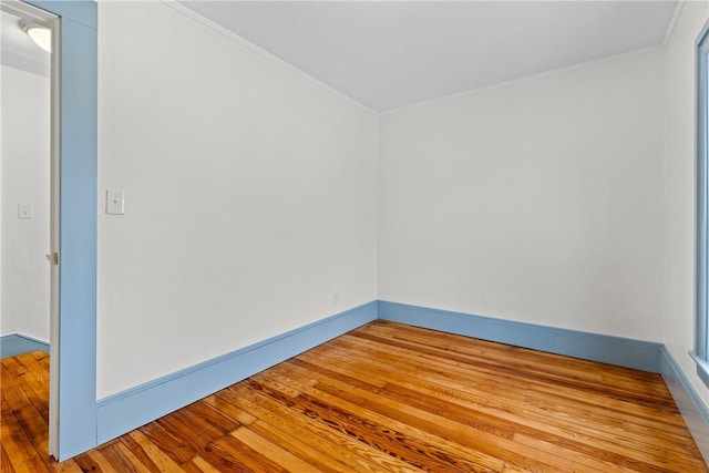 empty room with hardwood / wood-style flooring