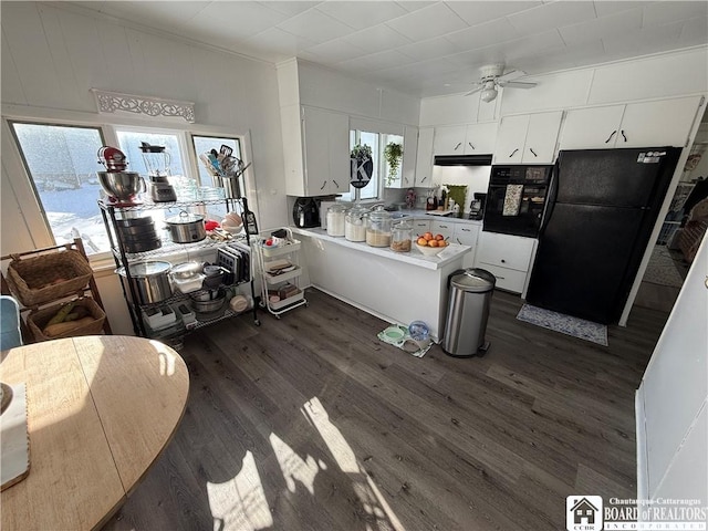 kitchen with ceiling fan, white cabinets, dark hardwood / wood-style flooring, and black appliances