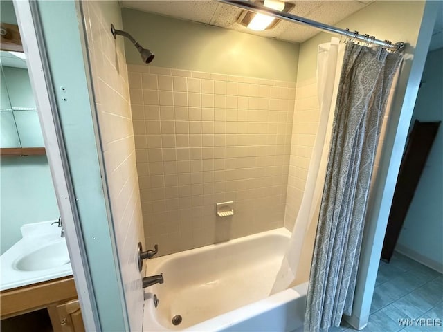 bathroom with vanity and shower / tub combo with curtain