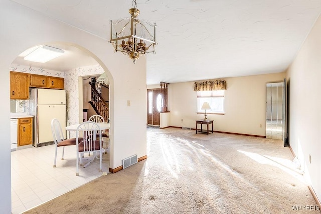 interior space featuring a notable chandelier