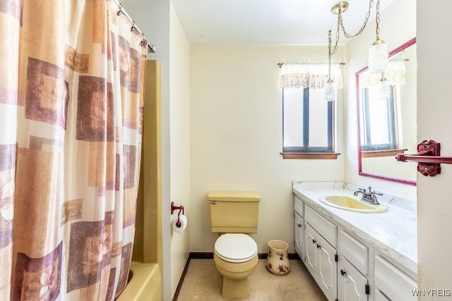 full bathroom with vanity, toilet, and shower / bath combo with shower curtain