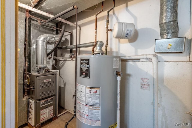 utility room featuring water heater