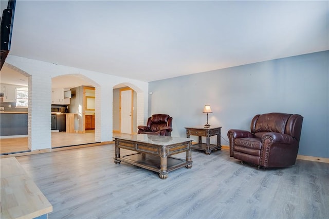 living room with light hardwood / wood-style floors