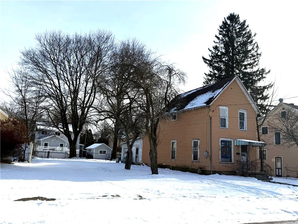 view of snow covered property