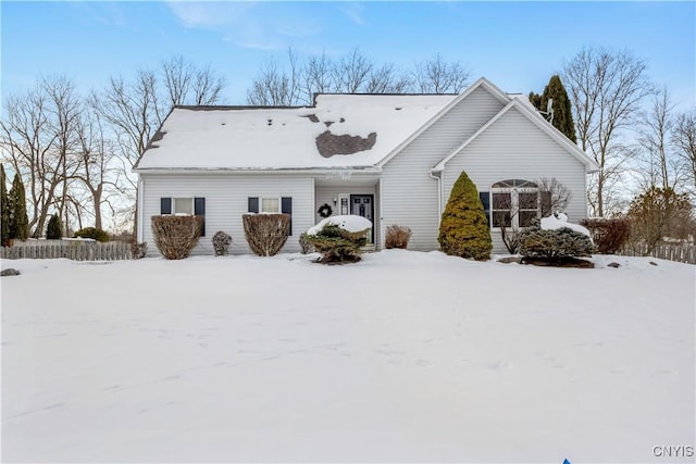 view of snow covered property