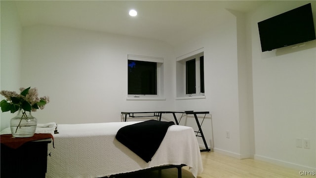 bedroom with light hardwood / wood-style flooring