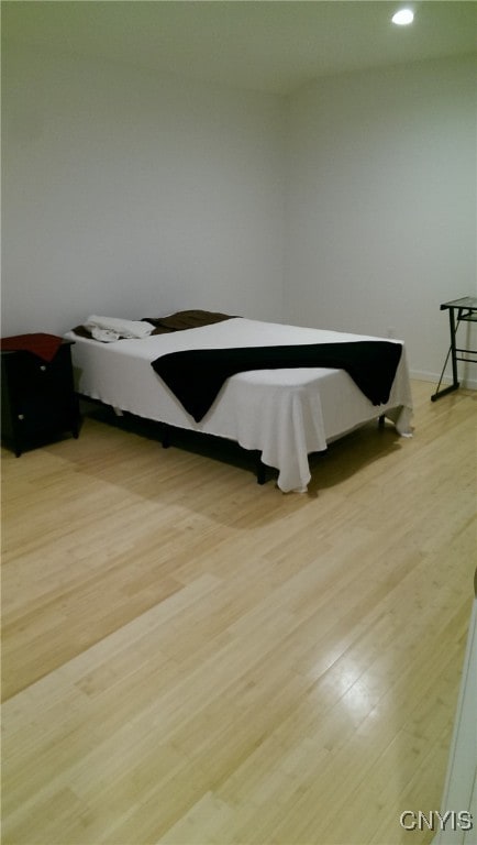 bedroom with light wood-type flooring