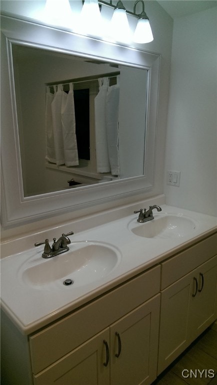 bathroom featuring vanity and tile patterned flooring