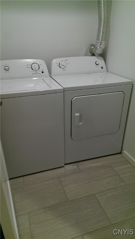 laundry room featuring washing machine and dryer