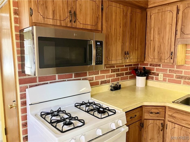 kitchen featuring white gas range oven