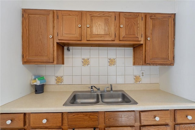 kitchen with sink and decorative backsplash