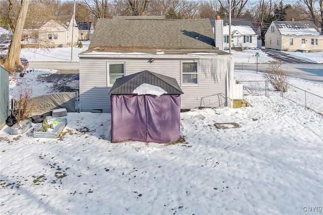 view of snow covered house