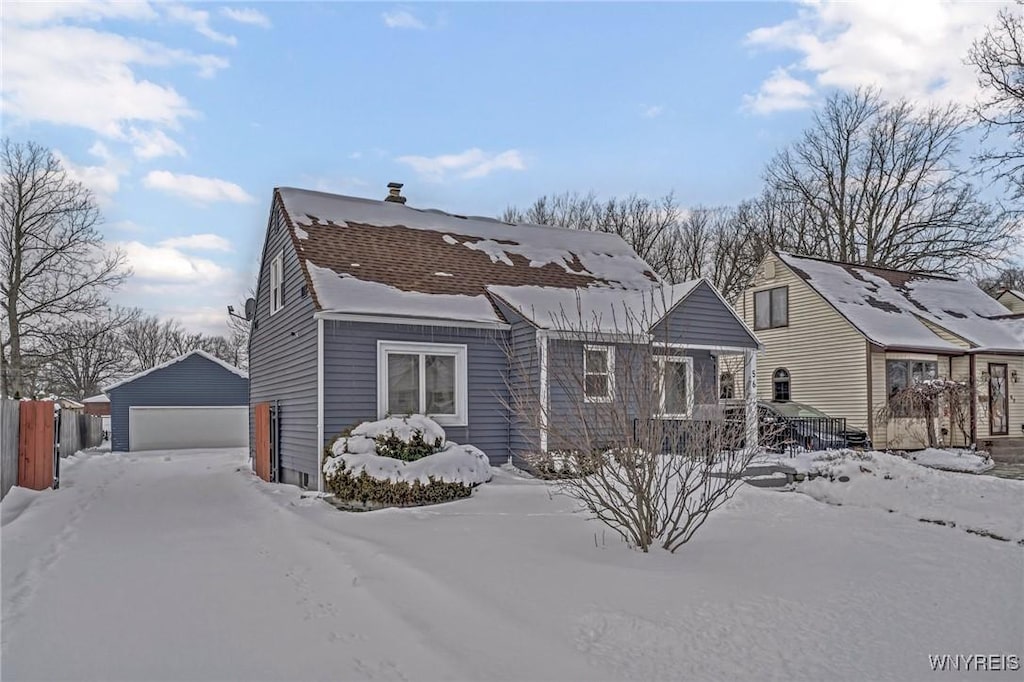 view of front of property with an outbuilding and a garage