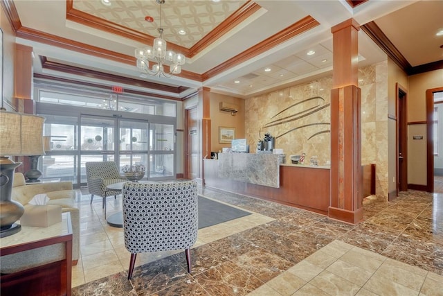 reception with a chandelier and decorative columns