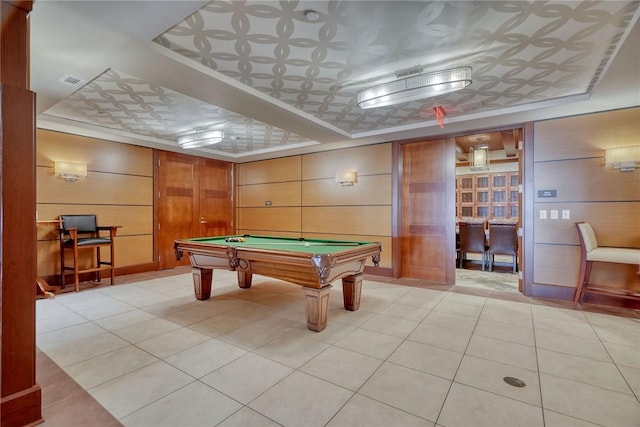 game room featuring light tile patterned flooring, billiards, and wooden walls