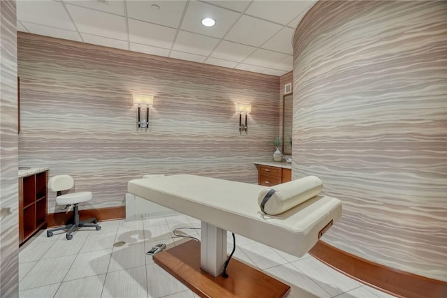 interior space with tile walls and tile patterned floors