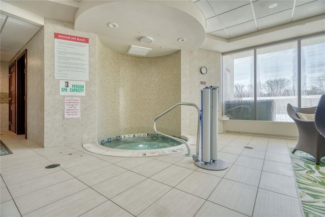 view of pool featuring an indoor hot tub