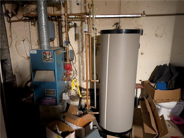 utility room with water heater