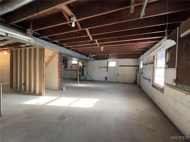 basement featuring water heater