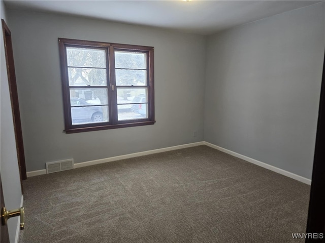 view of carpeted spare room