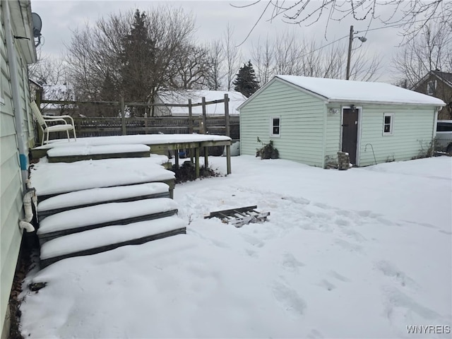 view of yard covered in snow