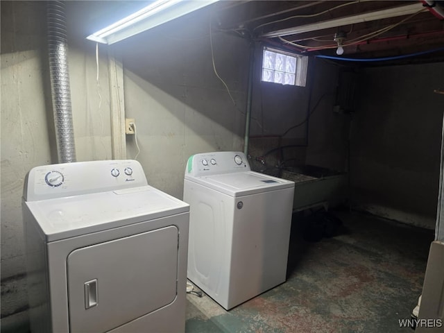 washroom featuring washer and dryer