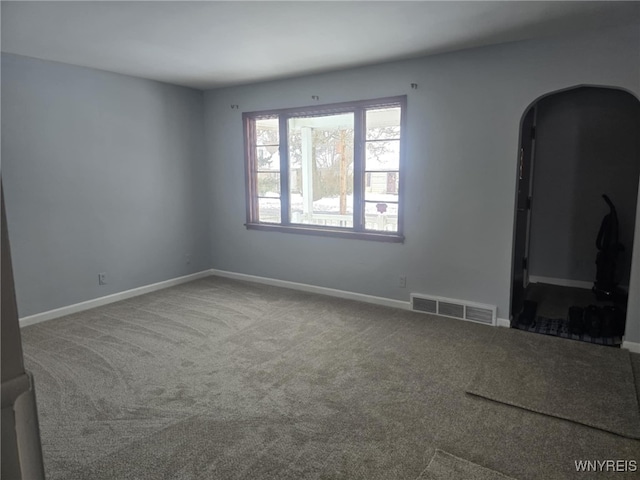 view of carpeted spare room